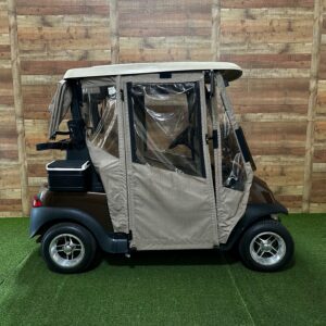 Covered golf cart with clear plastic windows